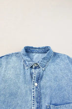 Light blue oversized denim shirt dress with classic collar and button front design for casual wear