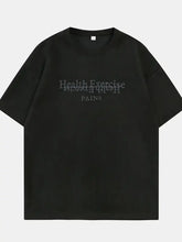 Black oversized cotton t-shirt with health exercise through pains design, machine wash cold tumble dry