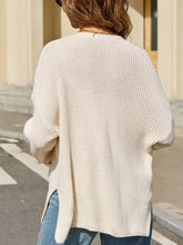 Übergroßer Strickcardigan in cremefarbenem Erdtton mit gerippter Struktur und Schlitzen