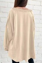 Beige oversized long sleeve crewneck sweatshirt with raglan sleeves made from soft fabric machine wash tumble dry safe