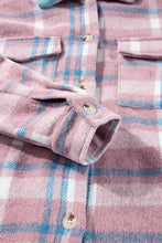 Oversized pink and blue plaid cotton flannel shirt with button-down closure