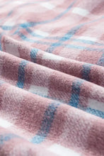 Oversized pink and blue plaid cotton flannel shirt with soft texture