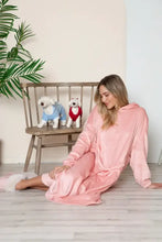 Oversized pink hooded plush blanket robe with pockets