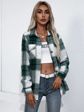 Green and white plaid oversized cotton flannel shirt with long sleeve length and pocket detail