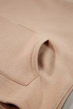 Oversized tan long sleeve sweatshirt with drawstring turtleneck