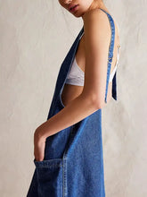 Oversized blue denim tank dress with adjustable straps front pocket made of machine wash fabric