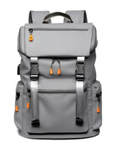 Gray oxford cloth backpack bag with orange accents and multiple pockets