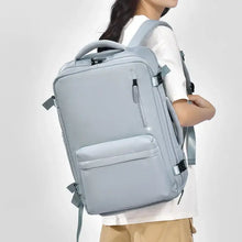 Light blue Oxford cloth travel backpack with laptop sleeve and shoe compartment