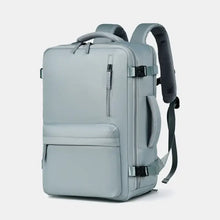 Sleek light gray Oxford cloth travel backpack with laptop sleeve