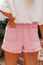 Pink paperbag waist denim shorts with cuffed hems and utility pockets