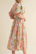 Pastel floral off-the-shoulder summer dress with ruffled sleeves and elastic waistband