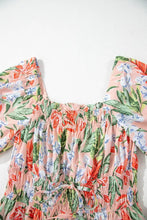 Pastel floral print off-the-shoulder summer dress with ruffled hem in pink and green hues