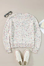 Pastel speckled floral print button front cardigan sweater with ribbed cuffs