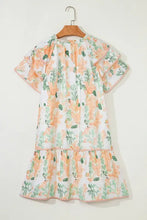White floral print dress with orange green accents in Peach and Green set
