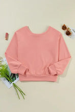 Peach long sleeve sweatshirt with bow round neck and back cutout