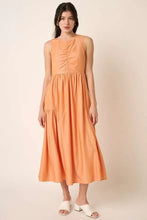 Peach sleeveless midi dress with ruched detail