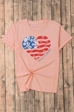 Peach T-Shirt with Heart-Shaped American Flag Design and Blue Jeans
