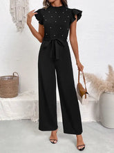 Pearl detail ruffled cap sleeve jumpsuit in black with white studs