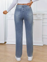 Light-wash denim pearl embellished high waist straight jeans with classic back pockets and distressed details back view