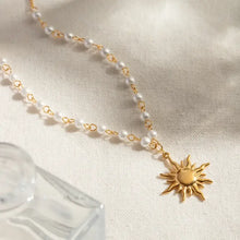 Pearl sun necklace with 18k gold-plated chain and sun pendant