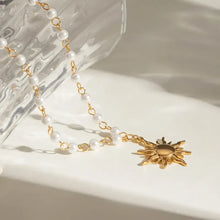 Pearl sun necklace with 18k gold-plated chain and sun pendant