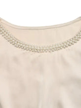 Cream-colored pearl trim satin bodysuit with delicate small round pearls along the neckline trim satin design