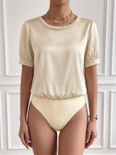 Cream satin pearl trim bodysuit with short puffed sleeves and a pearl trim satin neckline for elegant wear
