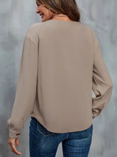 Perfee asymmetrical neck buttoned long sleeve beige blouse with jeans