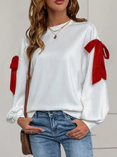 Perfee Bow Round Neck Long Sleeve Sweatshirt with red shoulder bows