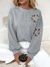 Perfee cutout pearl round neck grey sweatshirt with floral heart design