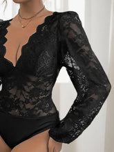 Black lace plunge long sleeve bodysuit with deep v-neckline in a Perfee lace plunge long sleeve bodysuit design