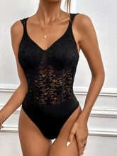 Black lace sleeveless bodysuit with corset front and high-cut legs in the perfee tied open back style