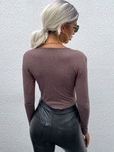 Perfee twist front v-neck long sleeve bodysuit in muted mauve with fitted sleeve length and subtle heathered texture
