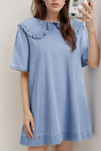 Light blue denim dress with peter pan collar and ruffled hem in short sleeve design