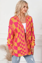 Vibrant pink and orange checkered cardigan, long sleeve women’s knit sweater