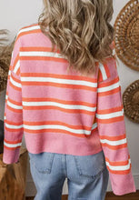 Pink and orange striped knit cardigan sweater with mock neck and buttons