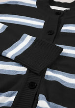 Striped knit cardigan sweater in pink, orange, black, white, blue with mock neck and buttons