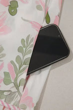 Black glossy triangular phone case with geometric design for floral romper
