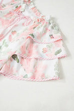 Pink floral print baby romper with ruffled hem and elastic waistband