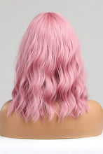 Pink bobo wave synthetic wig with bangs on mannequin