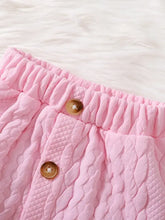 Pink machine wash skirt set with quilted shorts and lace trim