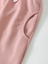 Pink fleece-lined Daddy’s Girl sweatshirt and pants set with snowflake sleeve design