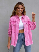 Pink distressed drop shoulder denim jacket with frayed edges