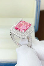 Pink emerald-cut 1 carat moissanite ring with double diamond halo in sterling silver
