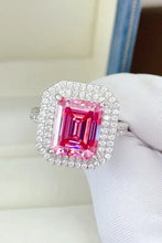 Stunning emerald-cut pink 1-carat moissanite ring with double halo in sterling silver