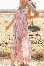 Pink floral halter neck maxi dress with crisscross back