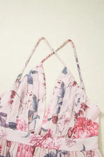 Pink floral halter neck maxi dress with crisscross back