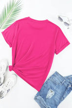 Pink floral print womens t-shirt with hot pink knot detail hem