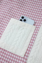White quilted iPhone 12 Pro Max case with Apple logo design