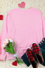 Pink heart long sleeve sweatshirt with contrast heart patches and plaid sneakers